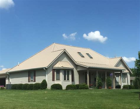 white house with tan metal roof|sierra tan metal roof.